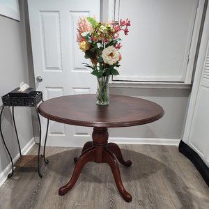 Big and small cherry wood tables